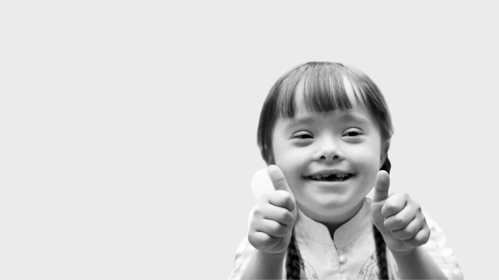 Child with two thumbs up - What Can You Teach Children About Emotions Banner
